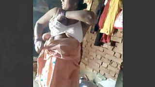 Desi Bhabhi Wearing Clothes While Husband Recording