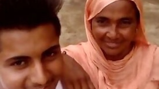 Boy and Desi MILF smile on camera thinking about upcoming porn music video