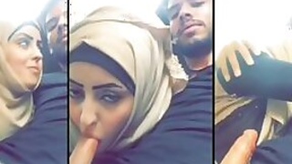 Horny young hottie in hijab giving her brother a blowjob