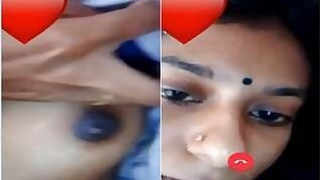 Pretty Indian girl shows her boobs on a video call